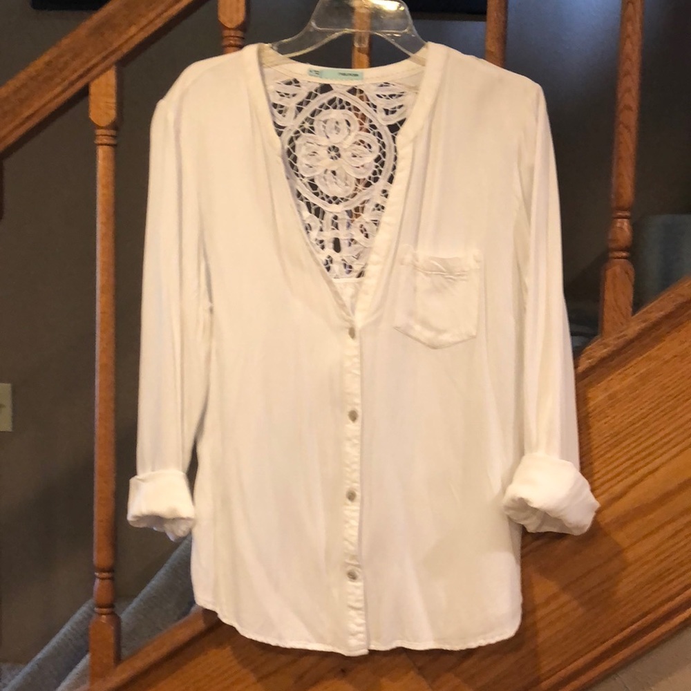 White button down with crochet detail.